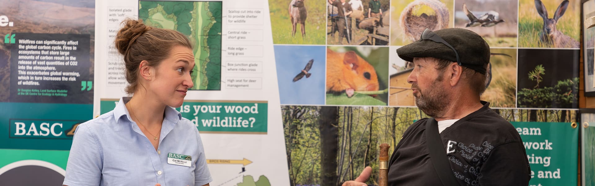 A BASC staff member talking to a member of the public