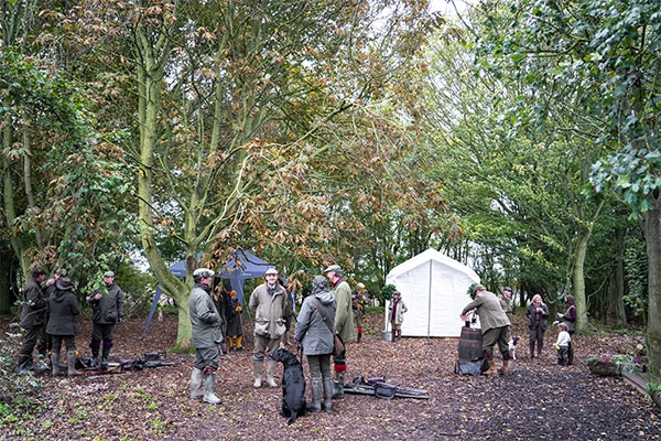 A group of shooters talking