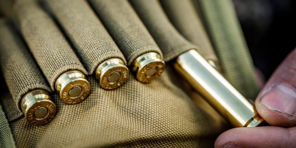 taking bullet out of pouch