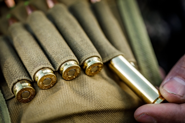 taking bullet out of pouch