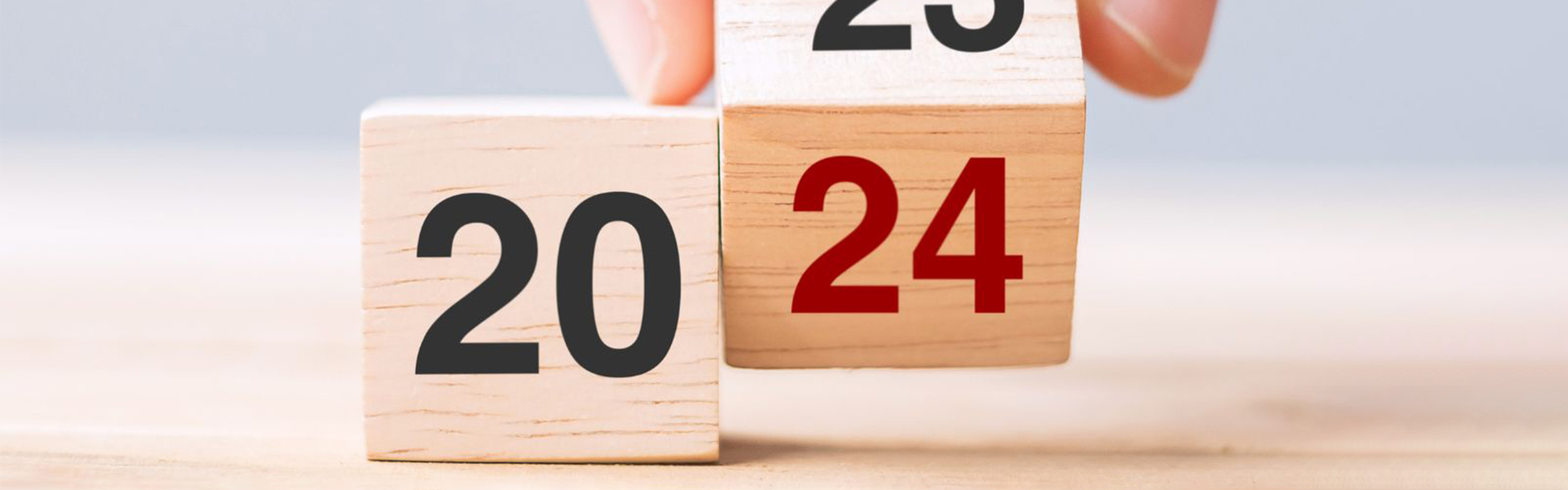 Wooden dice with 2024 on them