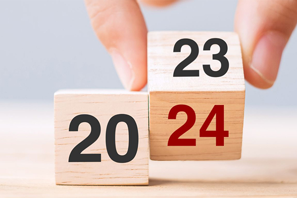 Wooden dice with 2024 on them