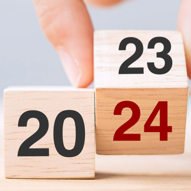Wooden dice with 2024 on them