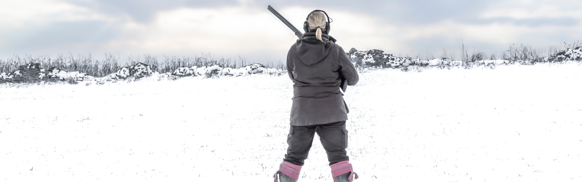 Woman shooting in snow