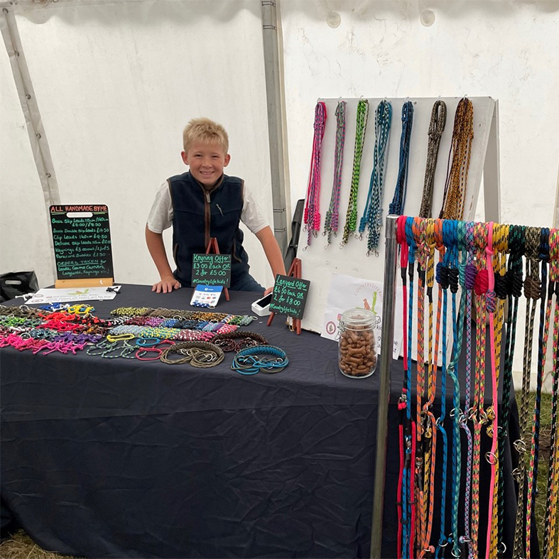Zach Turner standing at his stall