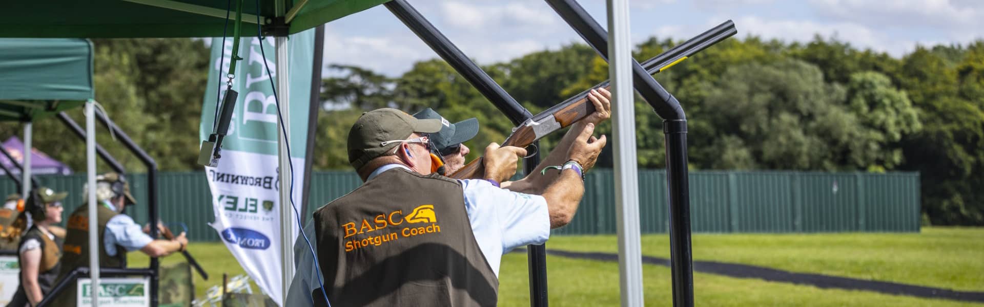 A shotgun coach with a student