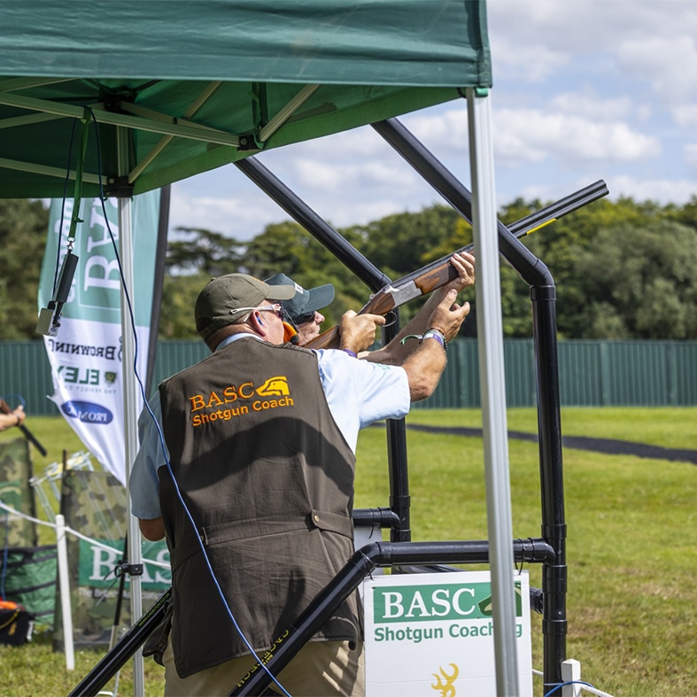 A shotgun coach with a student