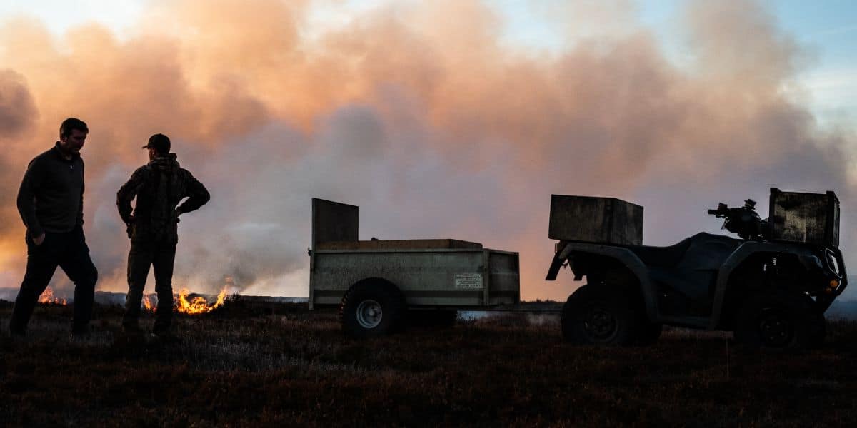 Gamekeepers burning heather moorland