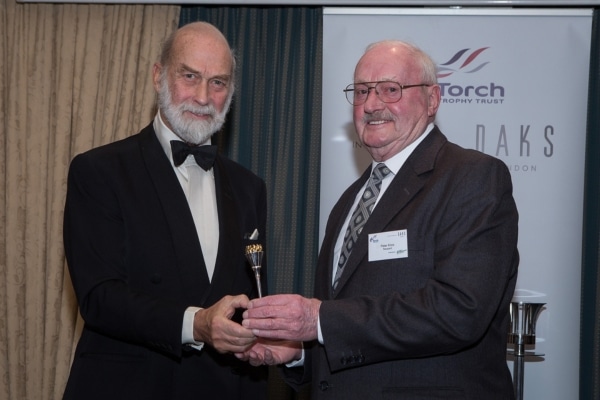 Peter Knox receiving his Torch Trophy from HRH Prince Michael of Kent