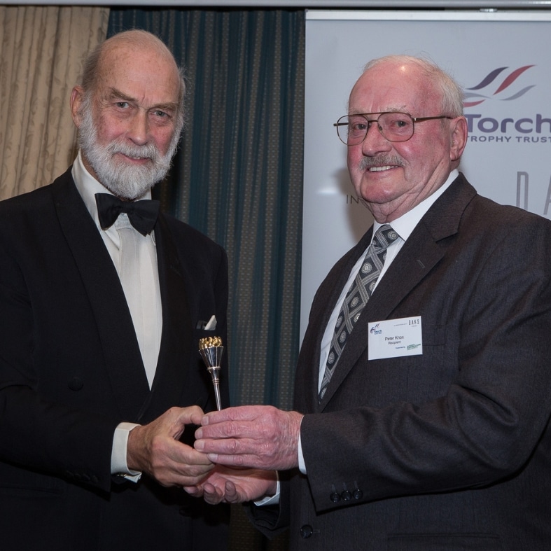 Peter Knox receiving his Torch Trophy from HRH Prince Michael of Kent
