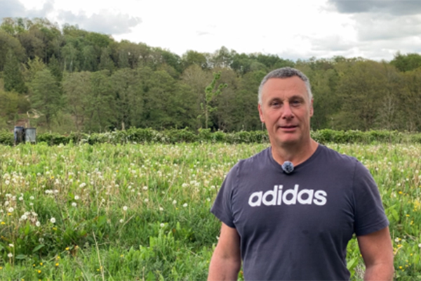 Jim Allsop standing in front of cover crops